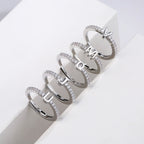Adjustable women's ring with initial - letter