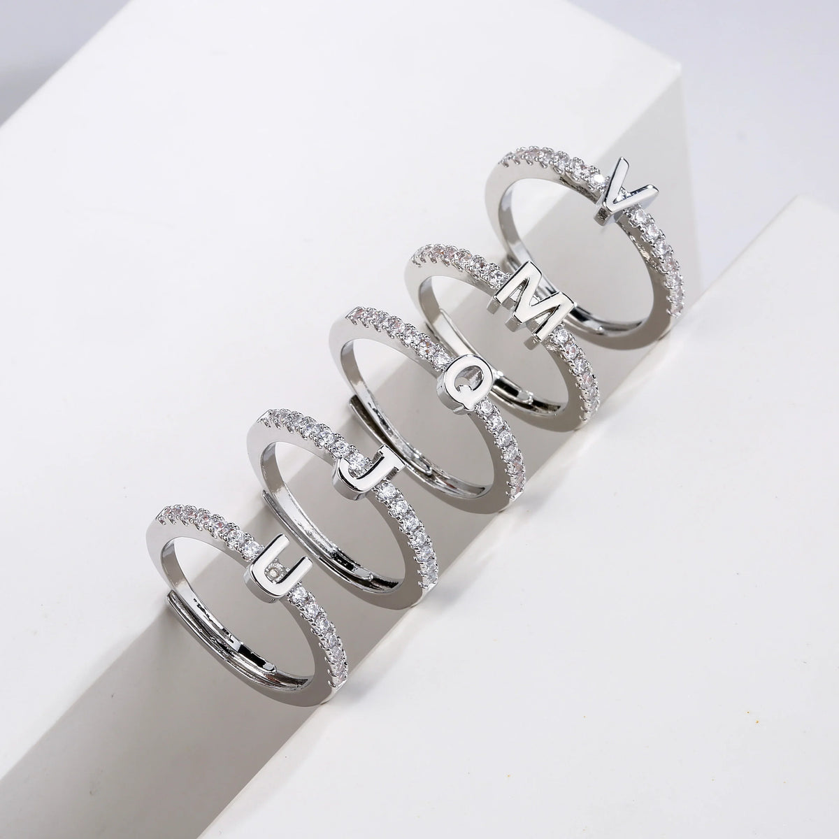 Adjustable women's ring with initial - letter
