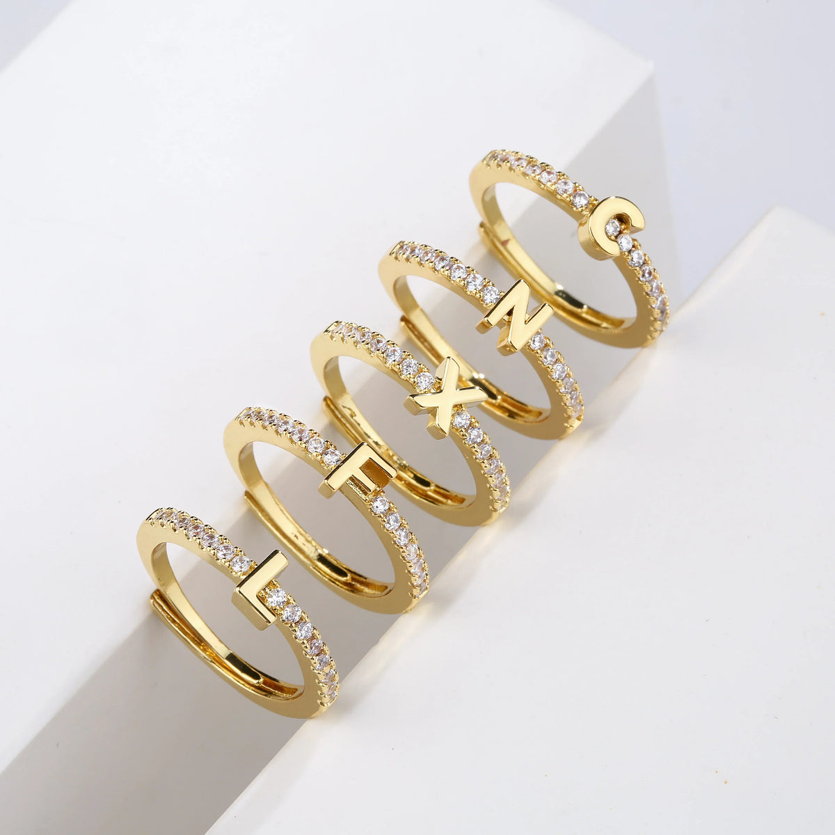 Adjustable women's ring with initial - letter