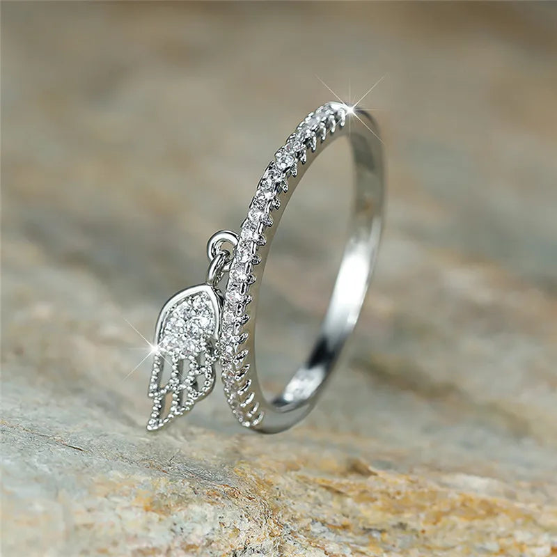 Ring with angel wing pendant silver