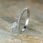 Ring with angel wing pendant silver