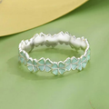 Ring with Green Four-Leaf Clovers