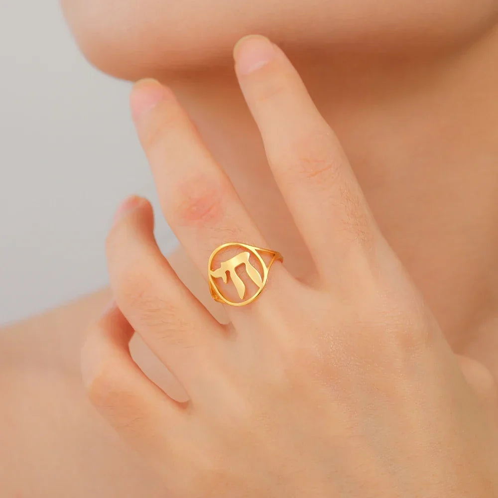 Hollow ring with the Jewish symbol of life Chai in gold