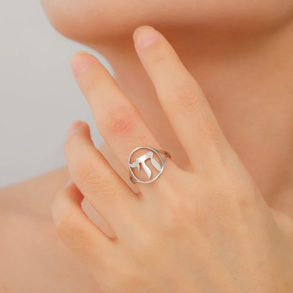 Hollow ring with the Jewish symbol of life Chai in silver