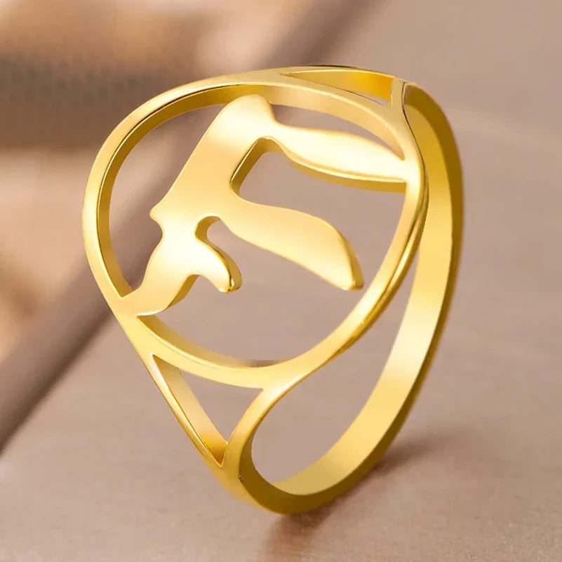 Hollow ring with the Jewish symbol of life Chai in gold