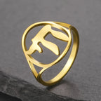 Hollow ring with the Jewish symbol of life Chai in gold