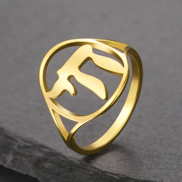Hollow ring with the Jewish symbol of life Chai in gold