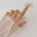 Starfish, Scallop Shell, and Zircon Ring in Silver