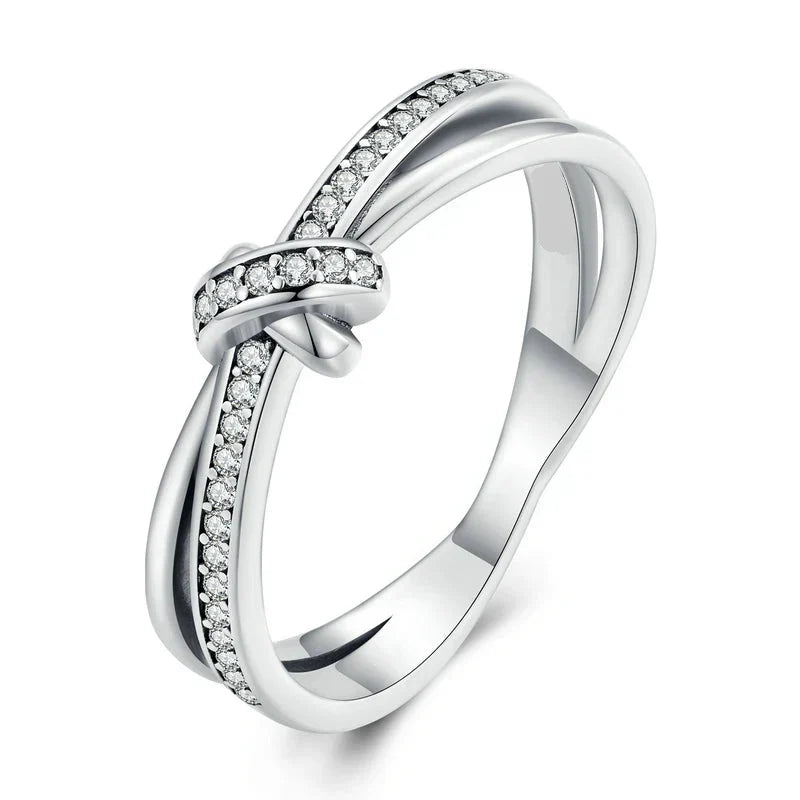Silver knot and rhinestone ring