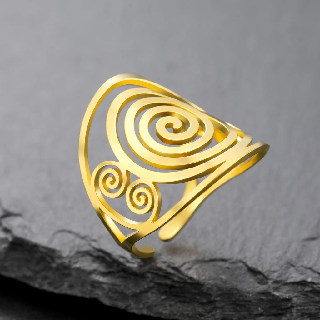 Wide spiral ring for women in gold