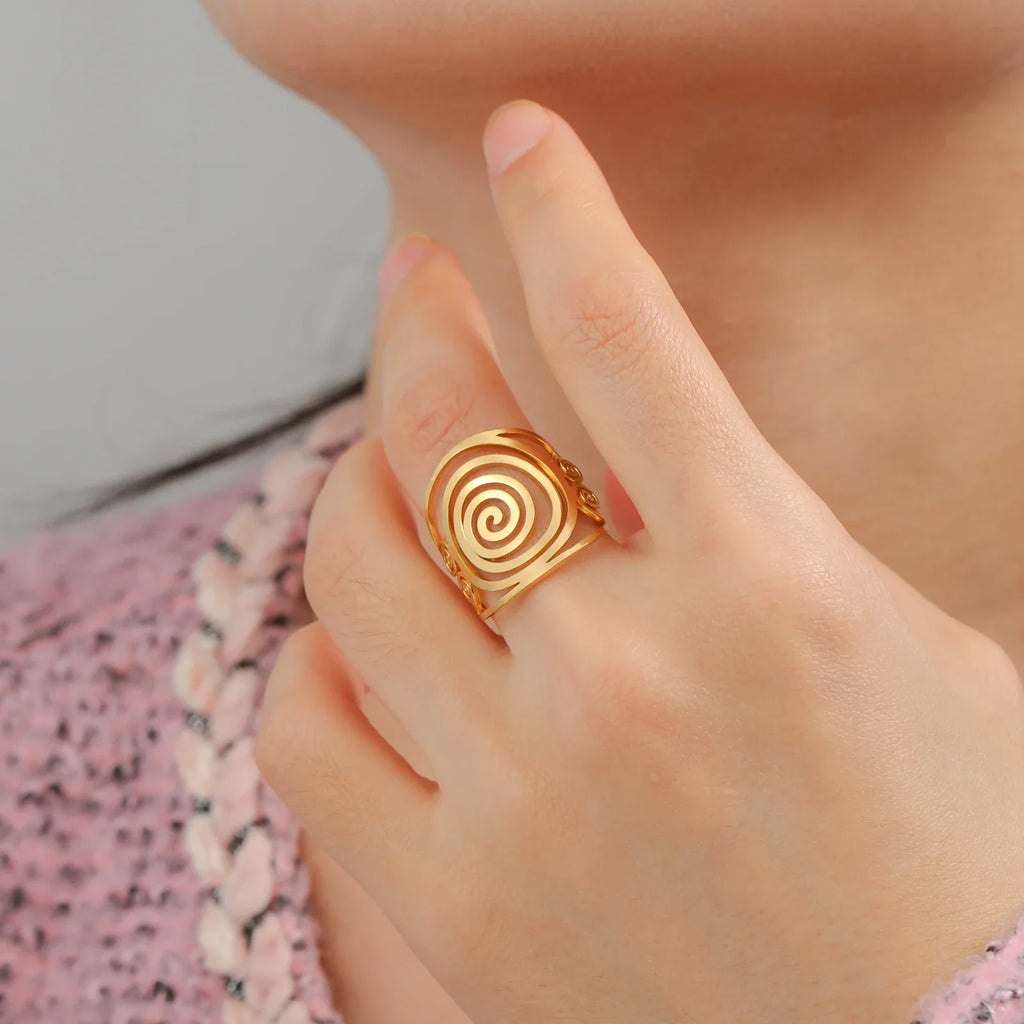 Wide spiral ring for women in gold