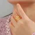 Wide spiral ring for women in gold