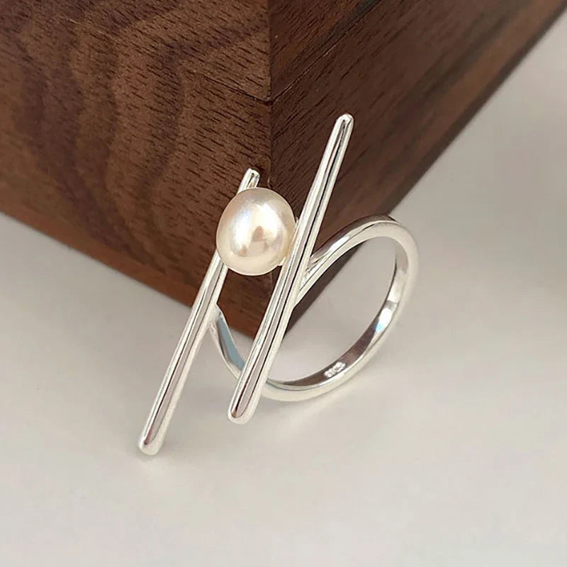 Stylish Ring with White Zircon Pearl
