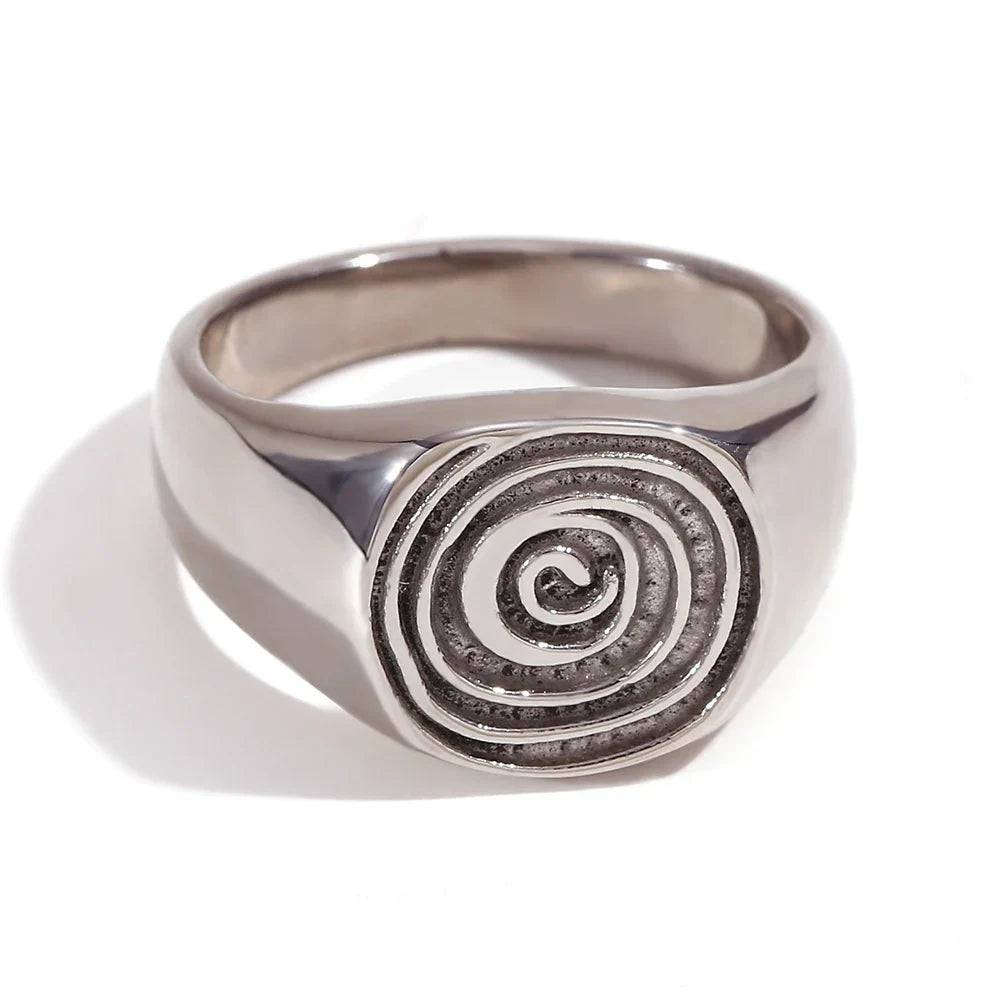 Signet ring with engraved spiral motif in silver