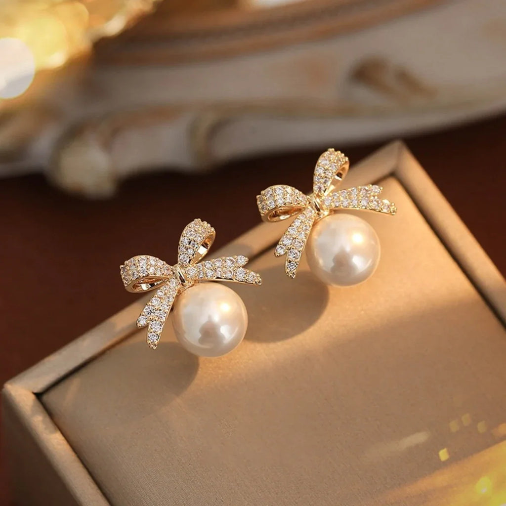 Elegant Stud Earrings with Pearl and Rhinestone Bow