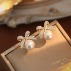 Elegant Stud Earrings with Pearl and Rhinestone Bow