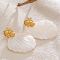 Shell pearl-colored earrings and starfish