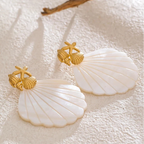 Shell pearl-colored earrings and starfish