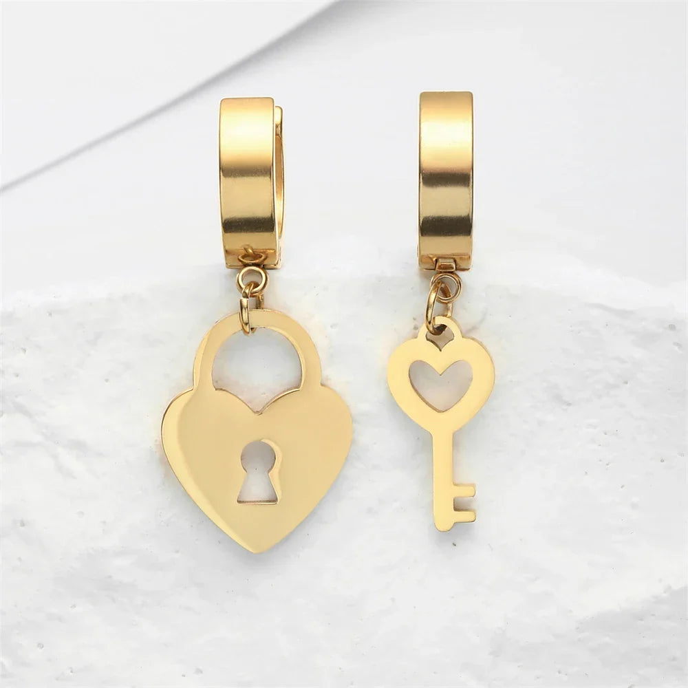 Gold key and padlock hoop earrings