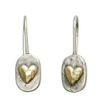 Silver and gold colored heart earrings
