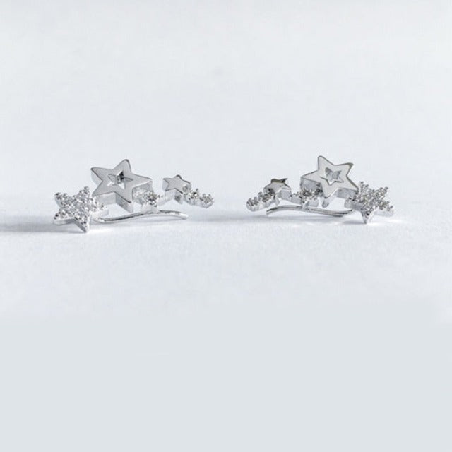 Star Piercing Earrings in Silver