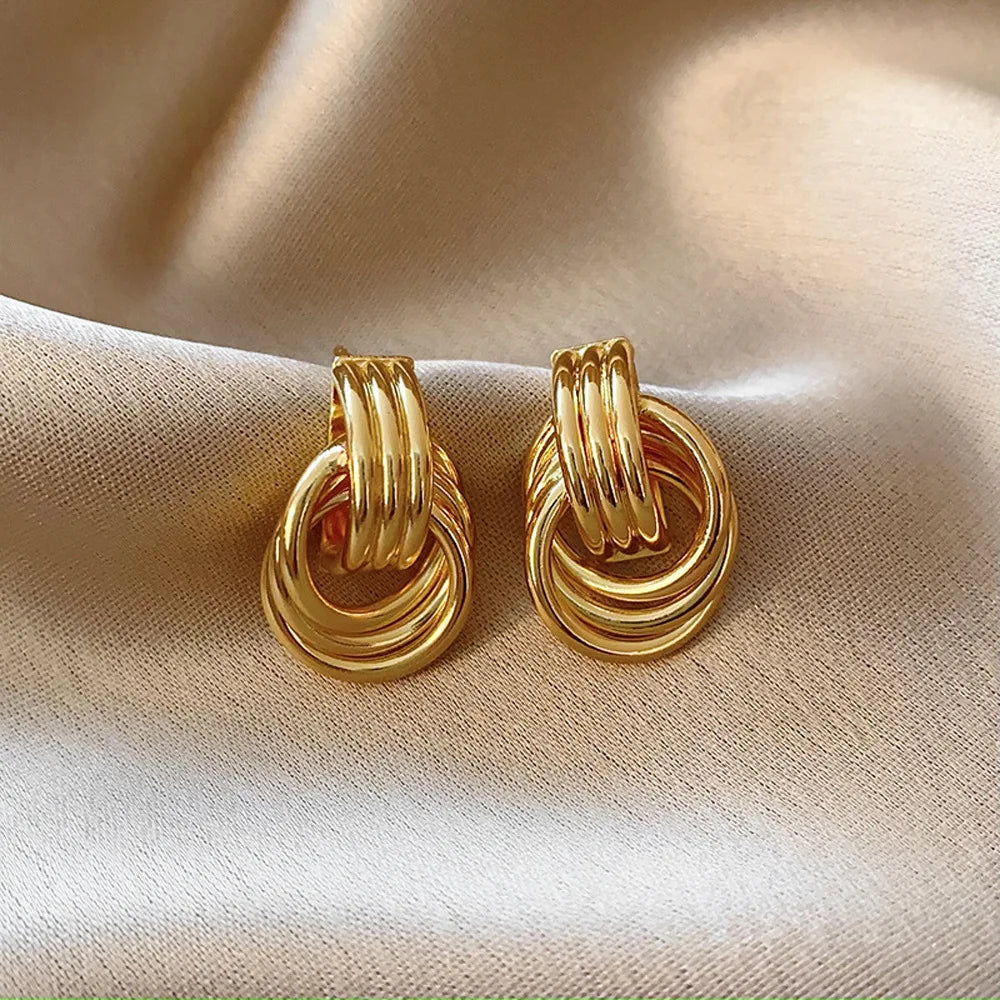 Women's bow earrings, gold