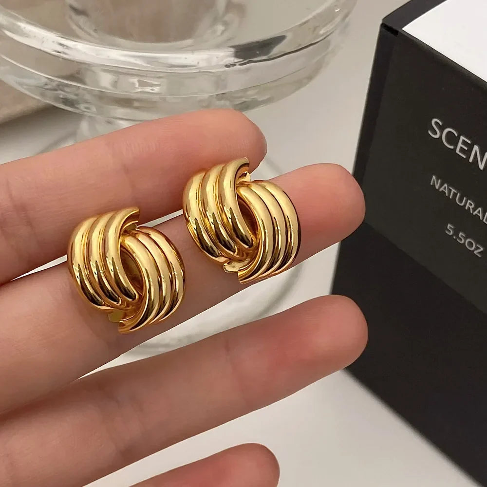 Women's bow earrings, gold