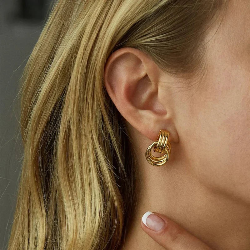 Women's bow earrings, gold
