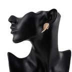 Dangling angel wing earrings with rhinestones