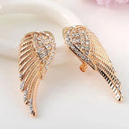 Dangling angel wing earrings with gold rhinestones
