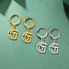 Gold dangling earrings with the Chai symbol of life on a crescent moon