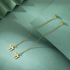 Chai Jewish life symbol drop earrings in gold