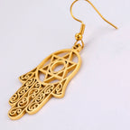 Dangling earrings with the Jewish protective symbol, Hamsa hand and Star of David, gold