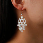 Dangling earrings with the Jewish protective symbol, Hamsa hand and Star of David, silver