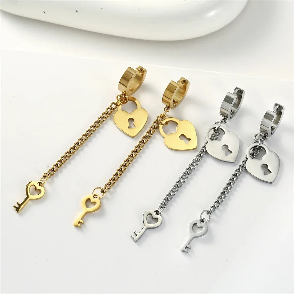 Gold key and lock dangle earrings