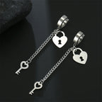 Silver key and lock dangle earrings