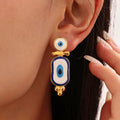 Ethnic Blue Eye Drop Earrings gold-tone