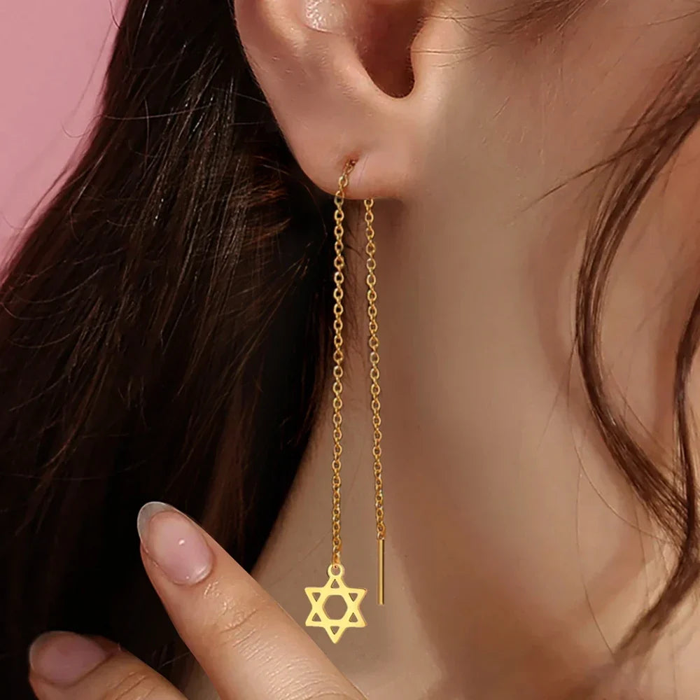 Long dangling earrings with the Star of David Jewish symbol in gold