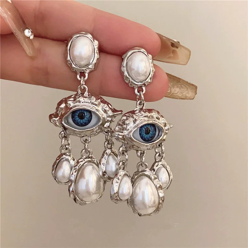 Blue Eye and Pearl Drop Earrings in silver