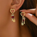 Women's dangling earrings with keys and padlocks