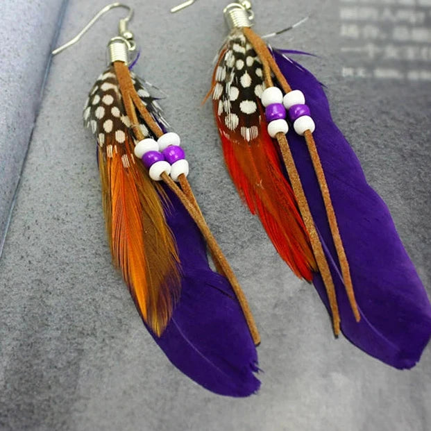 Apache-style feather earrings purple