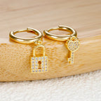 Key and lock hoop earrings with rhinestone key and lock gold