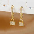 Key and lock hoop earrings with rhinestone gold