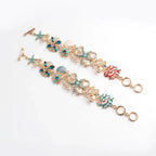 Bracelet with red-colored shells