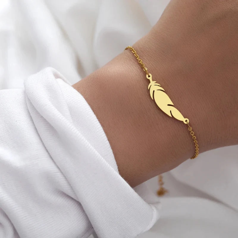 Charm Bracelet with Gold Feather