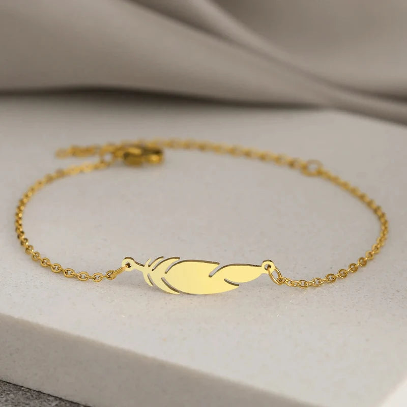 Charm Bracelet with Gold Feather