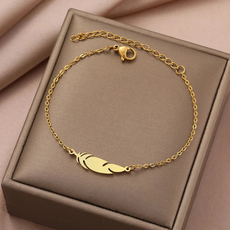 Charm Bracelet with Gold Feather