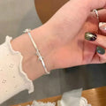 Silver women’s bow bracelet