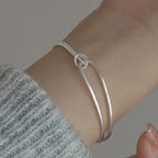 Modern-style bracelet with knot