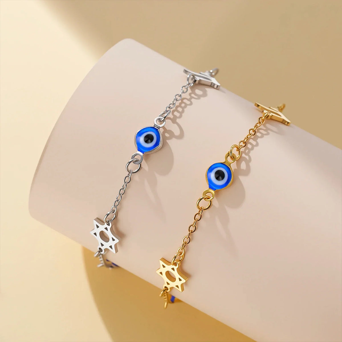 Bracelet with protection symbols: blue eye, Chai, and the Star of David